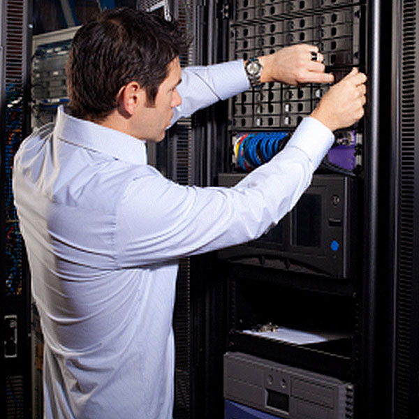 Man Changing RAID Drive RAID system specialists